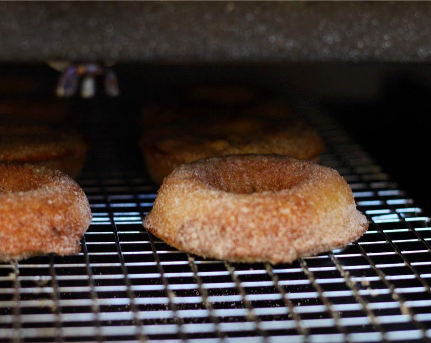 step 14 Place each doughnut on a wire rack and then place under the broiler, watching closely for 1 to 3 minutes until the sugar starts to bubble and melt.