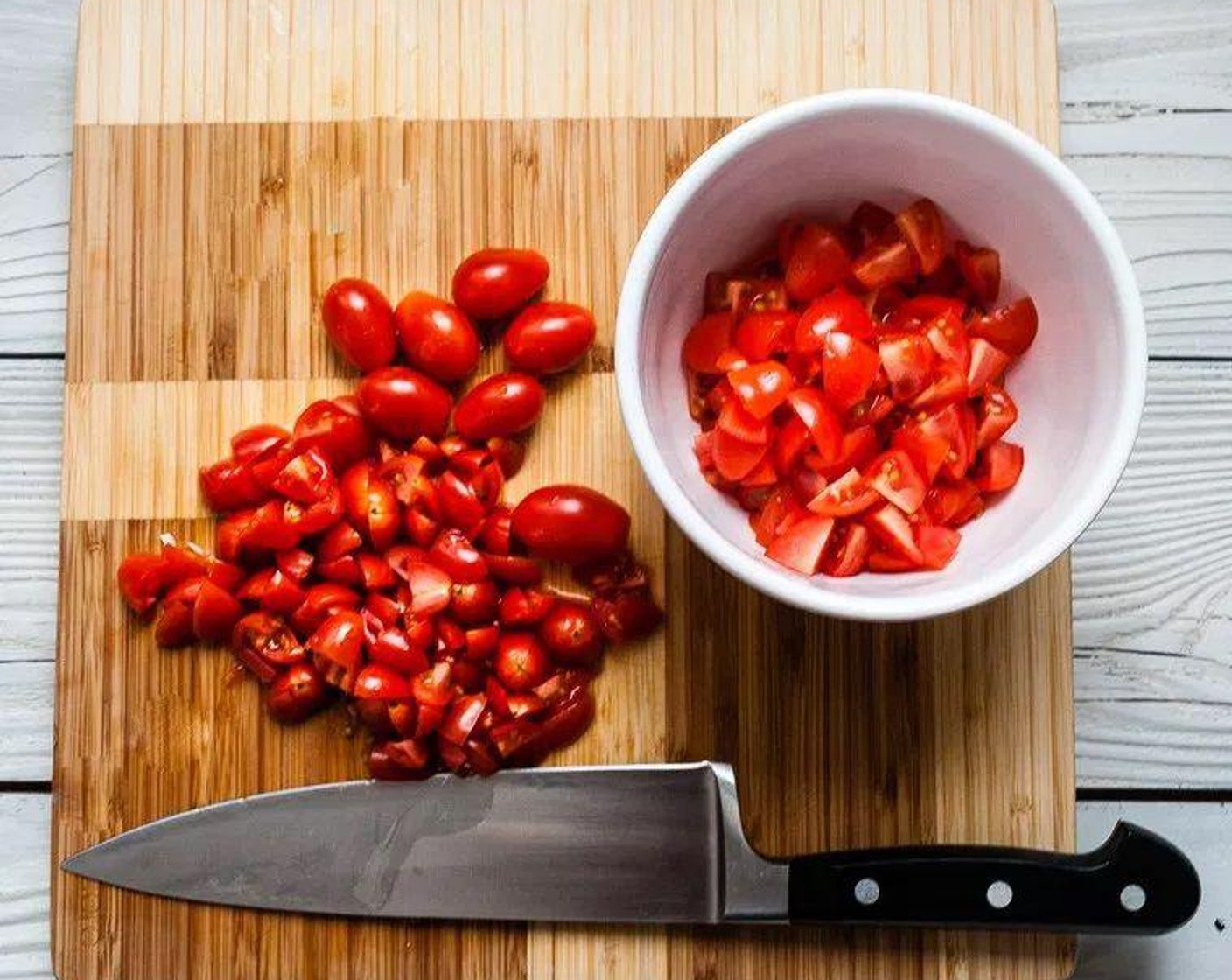 step 4 Halve Cherry Tomatoes (2 cups).