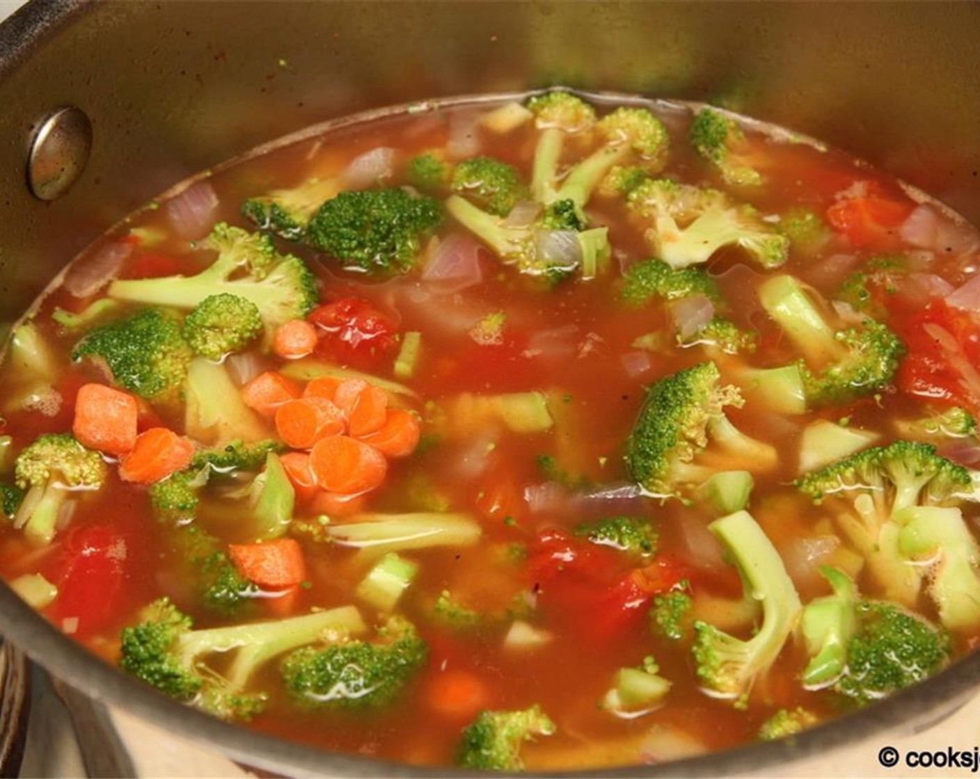 step 4 Then add Broccoli (3 cups) and the Carrot (1/4 cup) and cook until the pasta is done (follow package instructions).