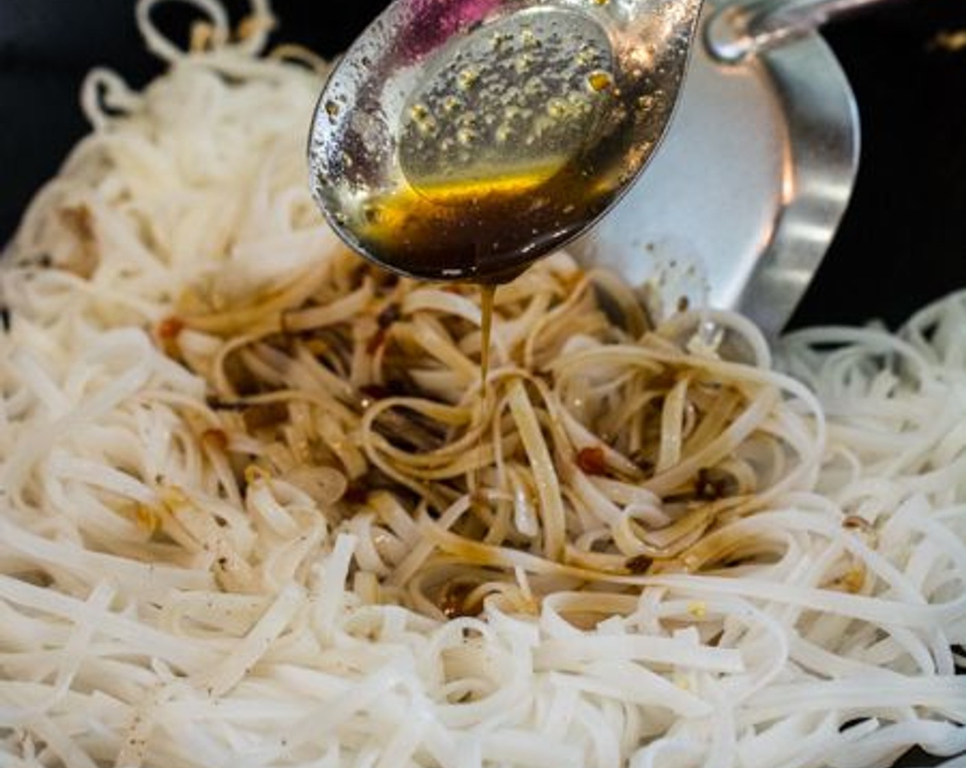 step 8 Add the Pad Thai noodles to the wok.