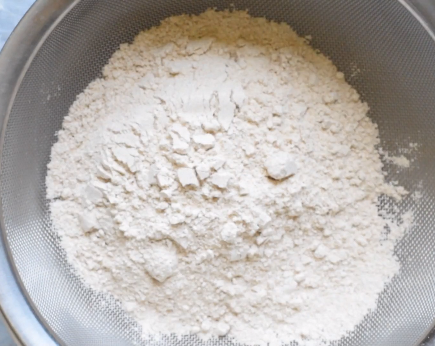 step 1 In a vessel add sieved Whole Wheat Flour (1 cup), Rice Flour (1/2 cup) along with Semolina (2 Tbsp). Mix using a whisk.
