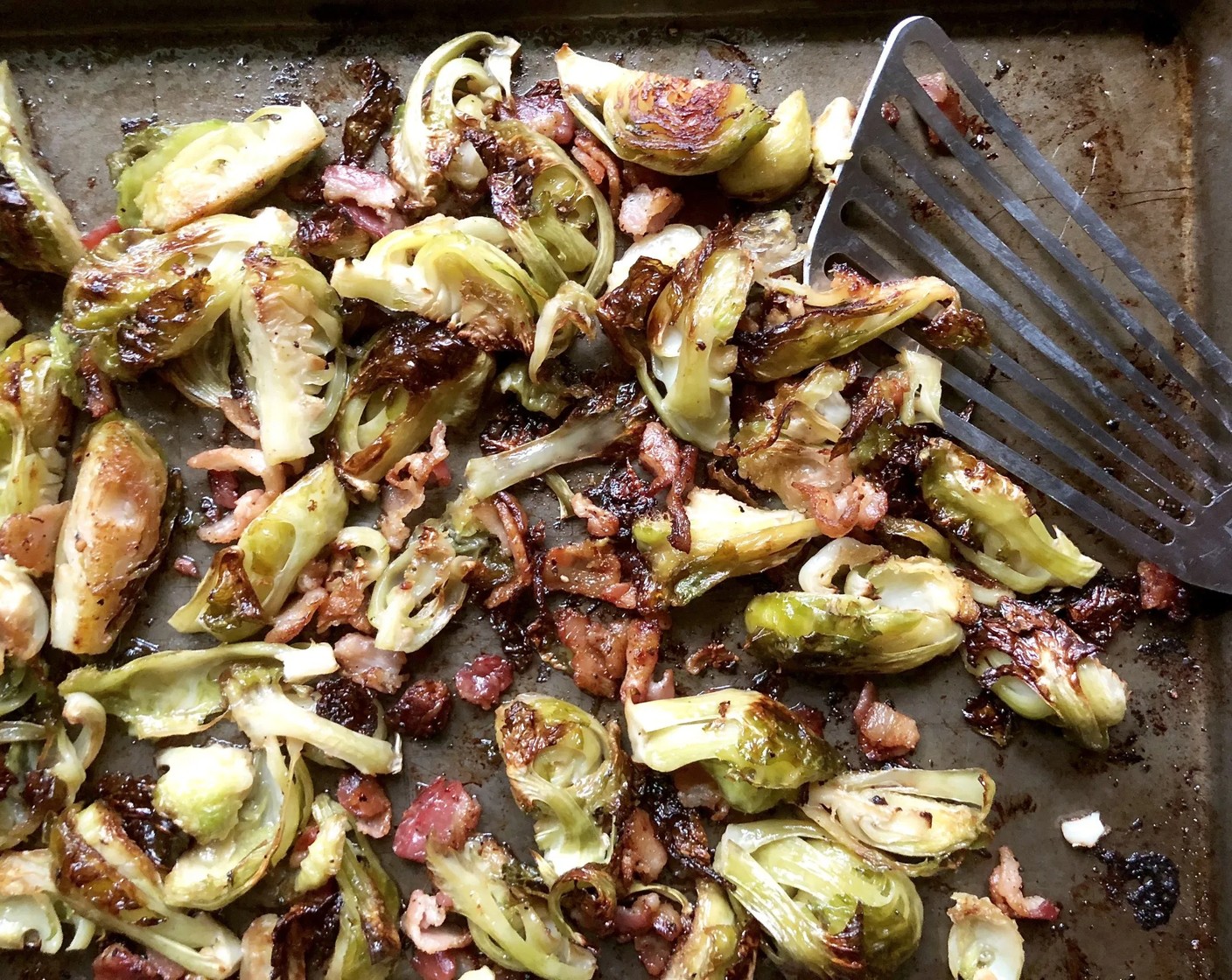 step 5 Roast the Brussels sprouts for 25 to 30 minutes, until they’re tender and nicely browned and the bacon is cooked. Toss once during roasting.
