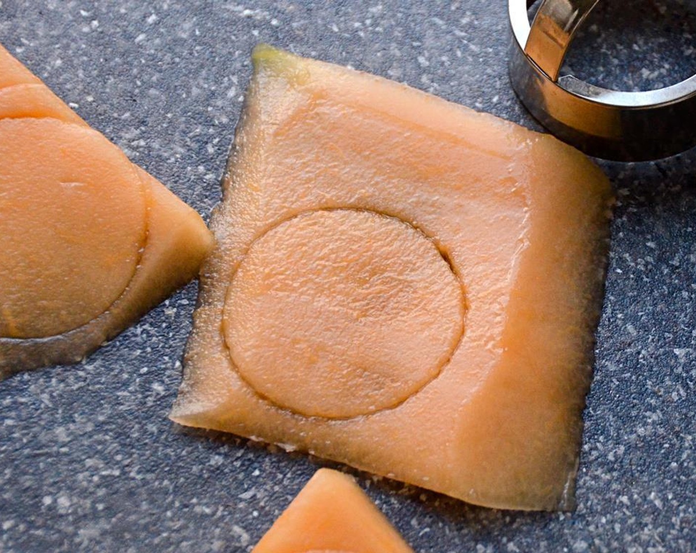 step 10 Slice the Cantaloupe (1/2) into thin slices. If you want to be fancy, use a biscuit cutter to cut the cantaloupe into "pepperoni rounds".