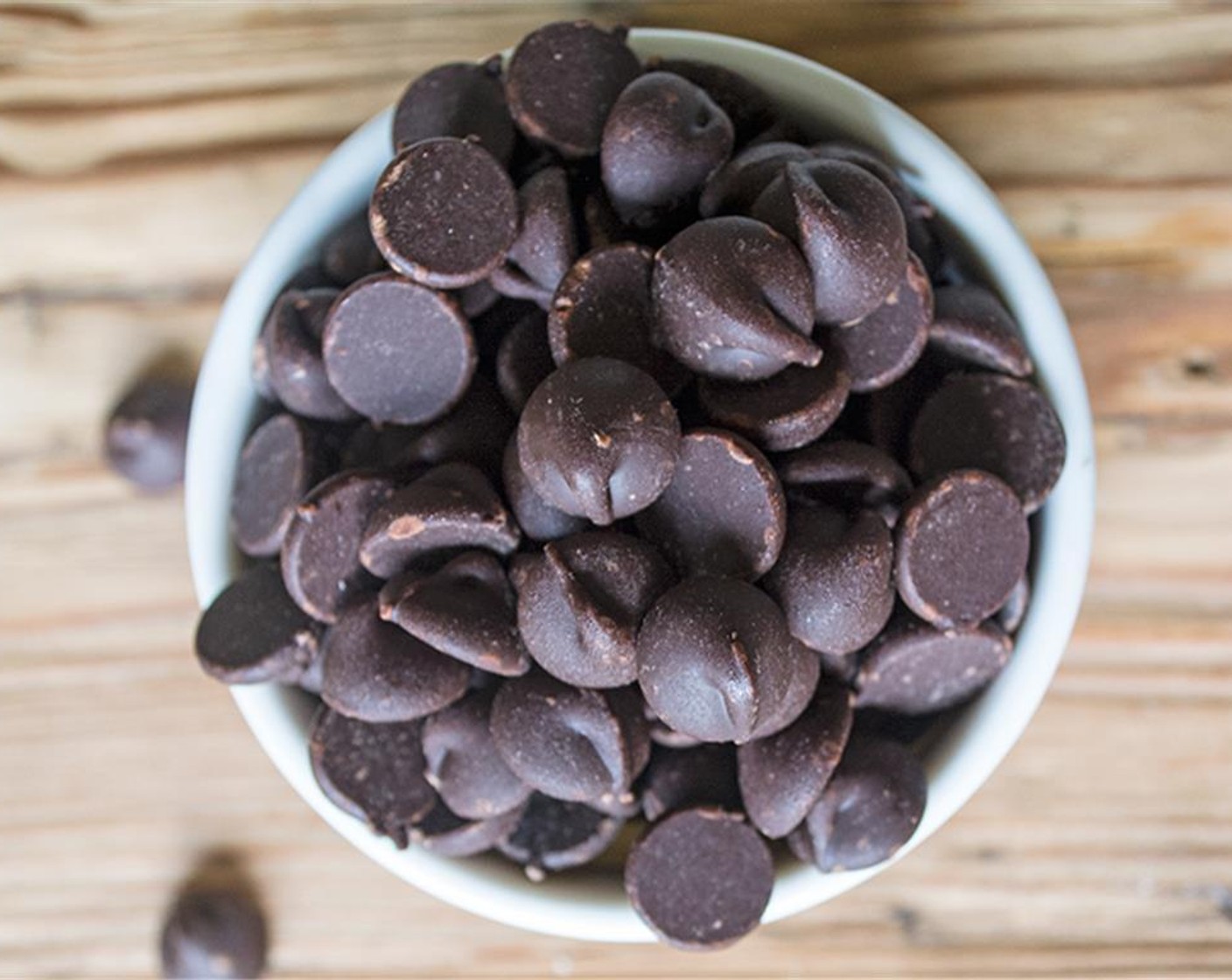 step 6 While toasted quinoa cools, melt Dark Chocolate Chips (1 1/2 cups) and Coconut Oil (1/2 Tbsp) in double boiler if you have one, or melt in a small pot on low stirring constantly and watching to make sure chocolate does not burn.