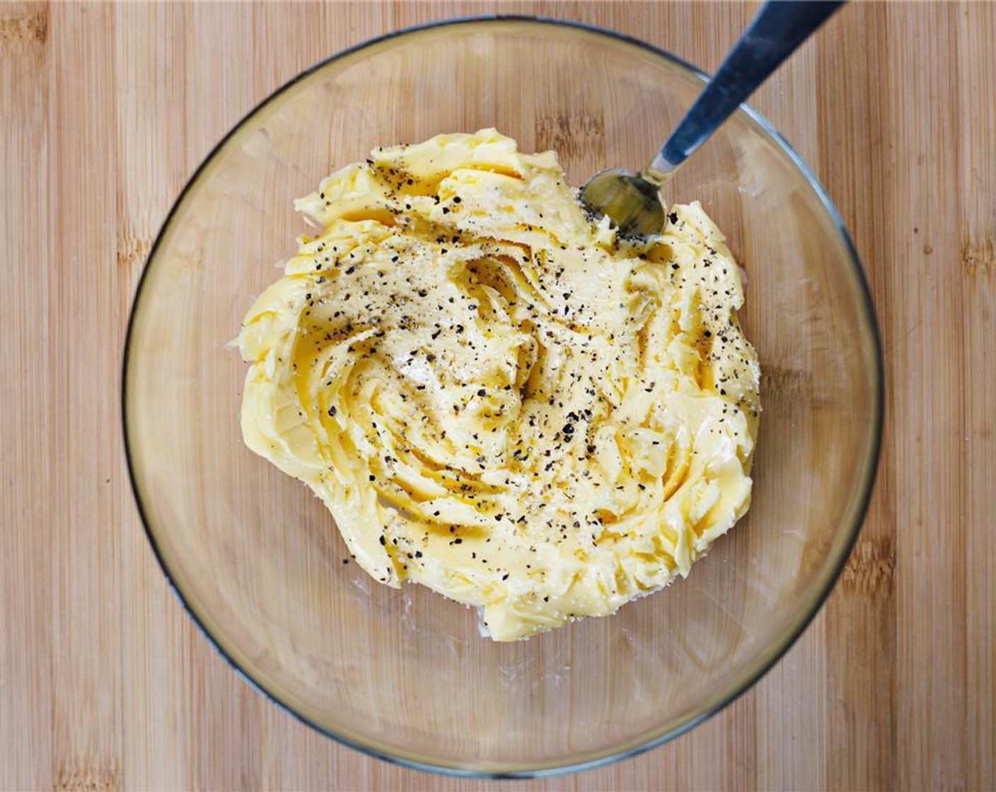 step 4 Place the unsalted butter in a bowl, and season with Salt (to taste) and Freshly Ground Black Pepper (to taste).