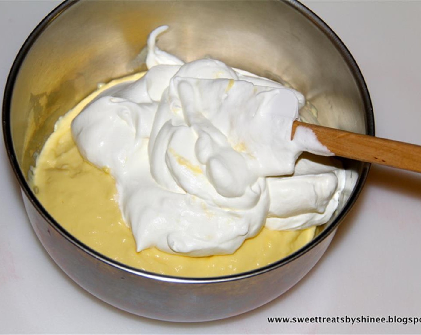 step 6 Whip Heavy Cream (1/2 cup) until it forms stiff peaks. Don’t overbeat it. Add whipped cream to the pastry cream and mix until well combined.