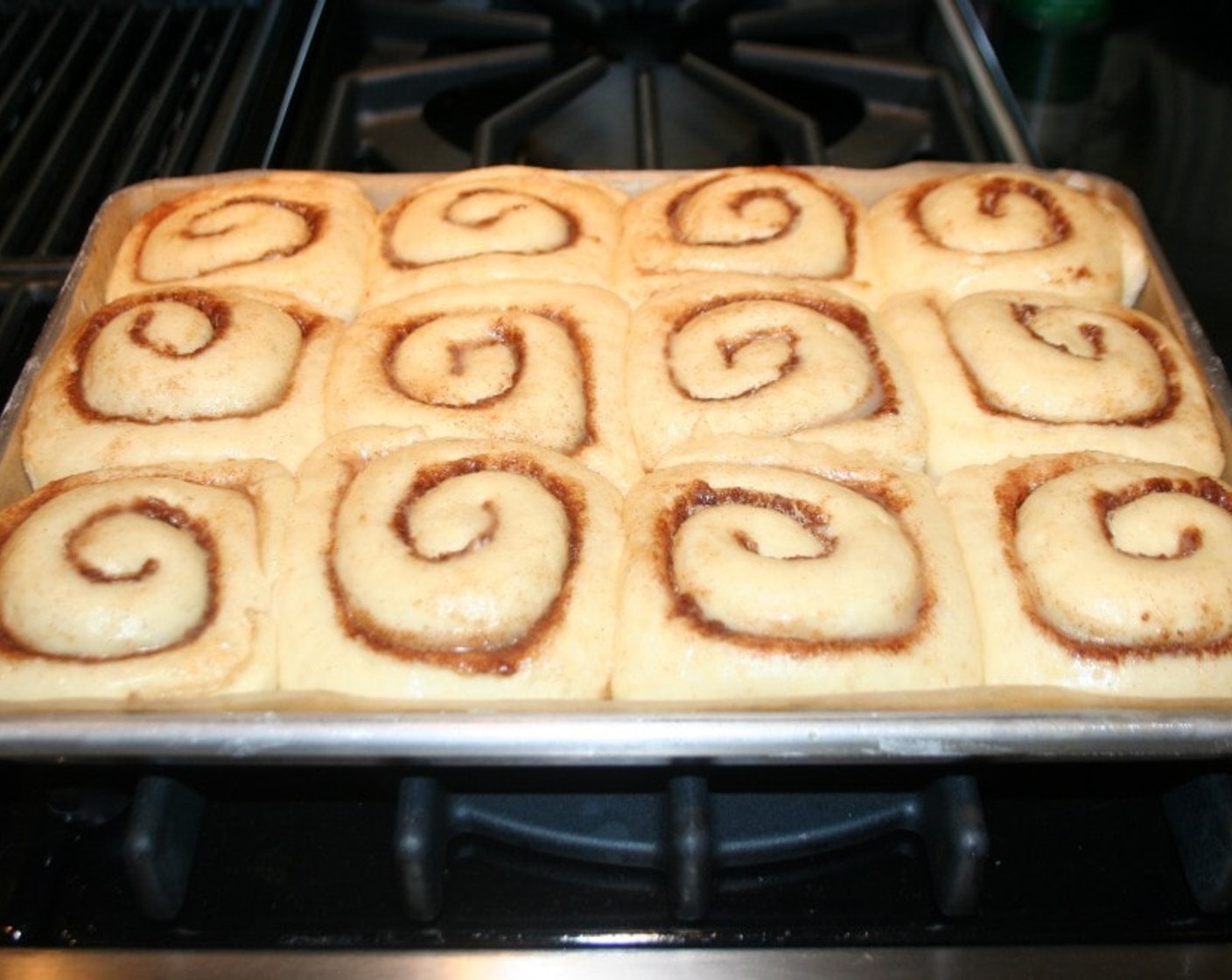 step 7 Place the cinnamon rolls in the pan and let the rolls rise another 1 hour to 1 1/2 hours until they double in size.