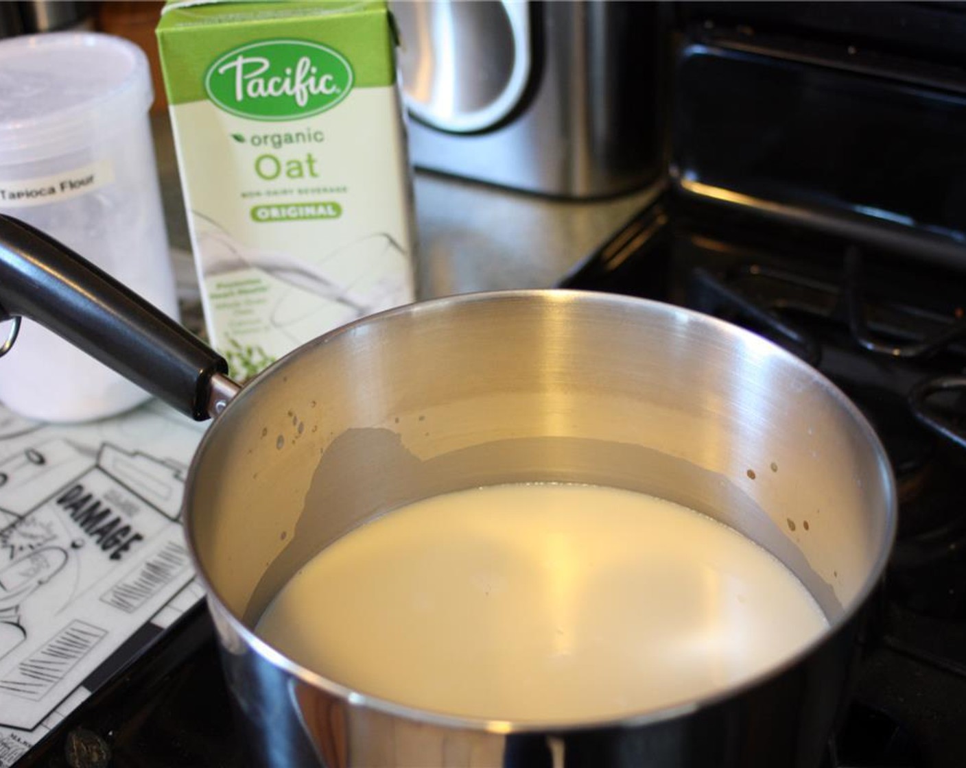 step 1 Heat the Oat Milk (4 cups) in a saucepan over high heat until it begins to boil.