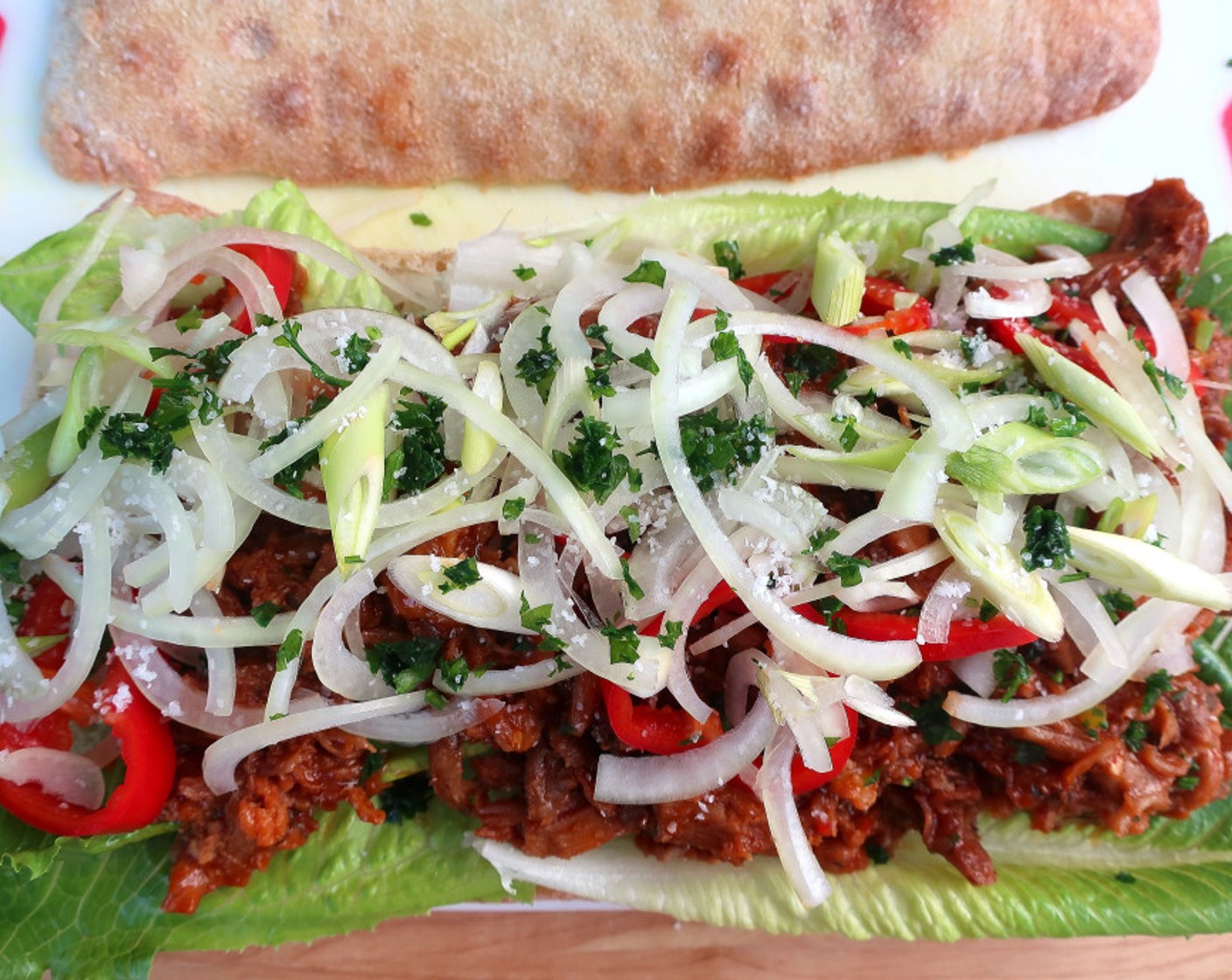 step 11 Slice Onion (1/2), Scallion (1 bunch), Red Chili Pepper (1/2), add Fresh Cilantro (1 Tbsp) and Salt (to taste), and mix and arrange evenly over the shredded pork.