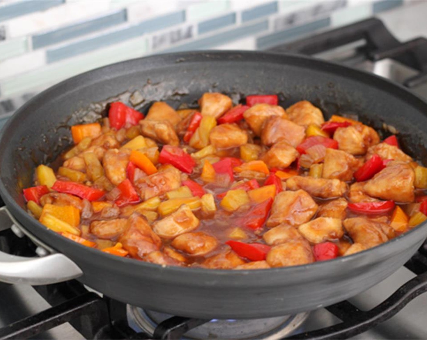 step 11 Add the cooked skinless chicken breasts to the skillet , so that the sauce coats the chicken and keep it on the heat for just a few minutes until the chicken warms through. Serve over your White Rice.