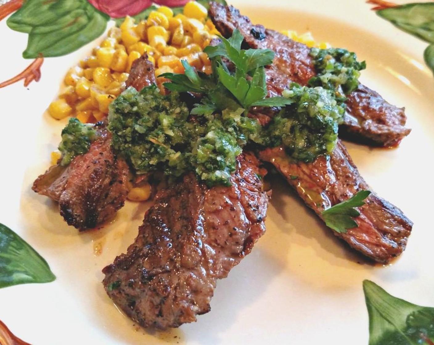 step 10 Once your beef has rested, cut it across the grain and serve with chimichurri and a few fresh springs of cilantro or flat-leaf parsley for presentation. Serve and enjoy!