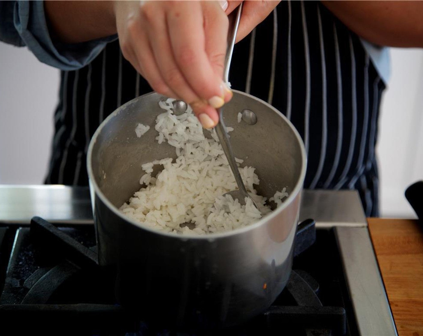 step 3 Remove from heat and fluff with a fork.