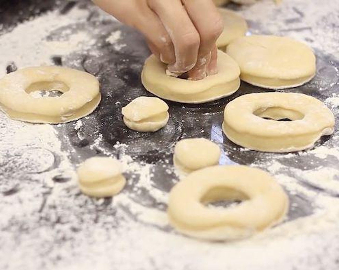 step 6 Use a small round cookie cutter to cut the center to make donut holes.