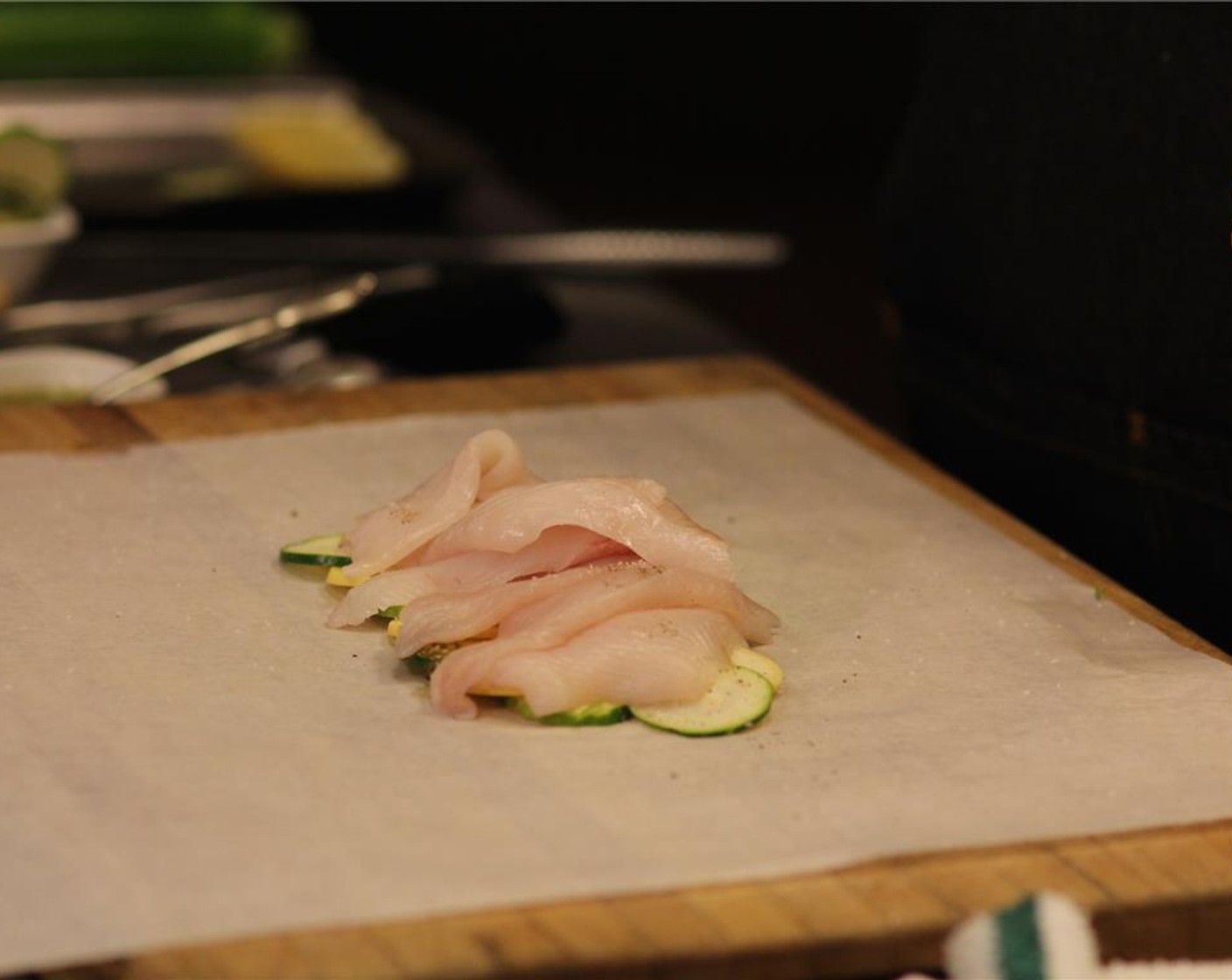 step 10 Season the fish with salt and pepper and lay down on top of the vegetables.