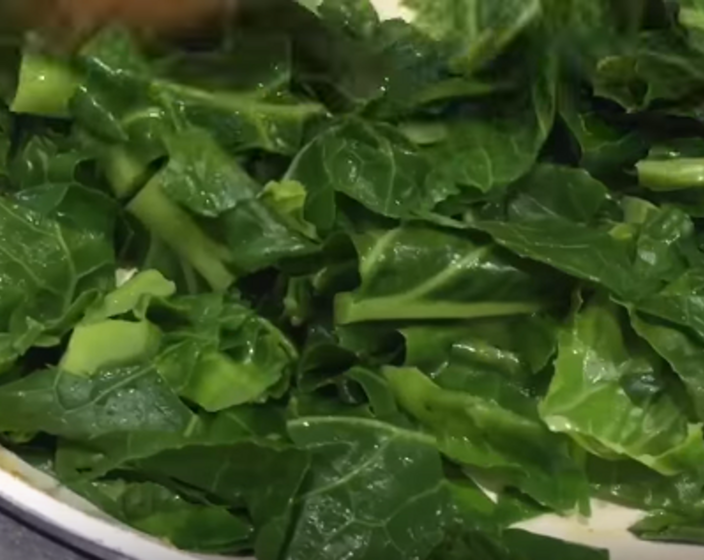 step 3 Add more water if needed then pour into a bowl. To the same pan add 1 inch deep of water, add the Spring Greens (1 head), cover and simmer for 2 minutes on high heat until bright green and tender. Mix greens and tomato bolognese in a bowl.