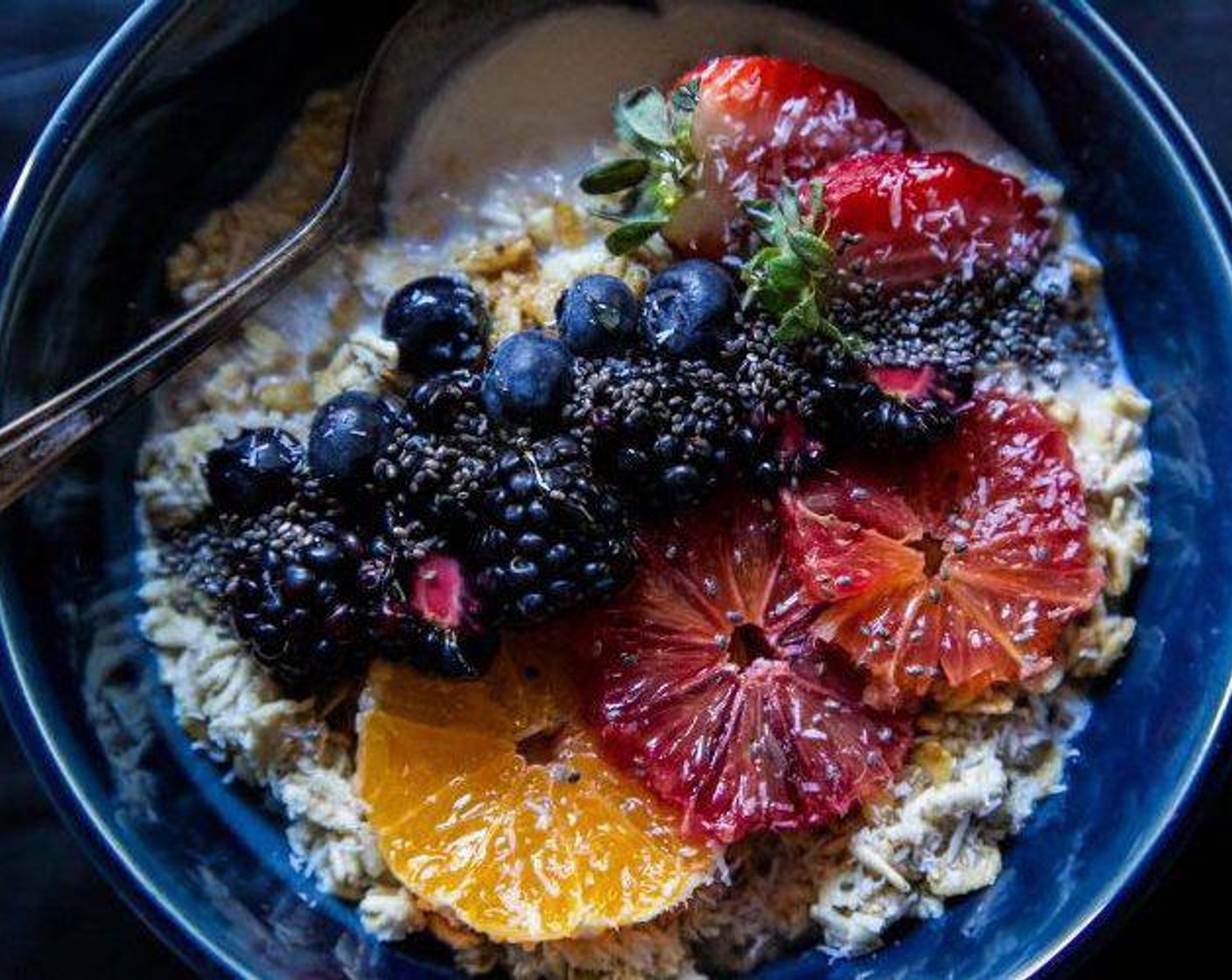 step 4 Top each bowl with Honey Granola (1/2 cup), Fresh Blackberry (1 cup), a piece of blood orange, Toasted Coconut Flakes (to taste), and Honey (to taste).