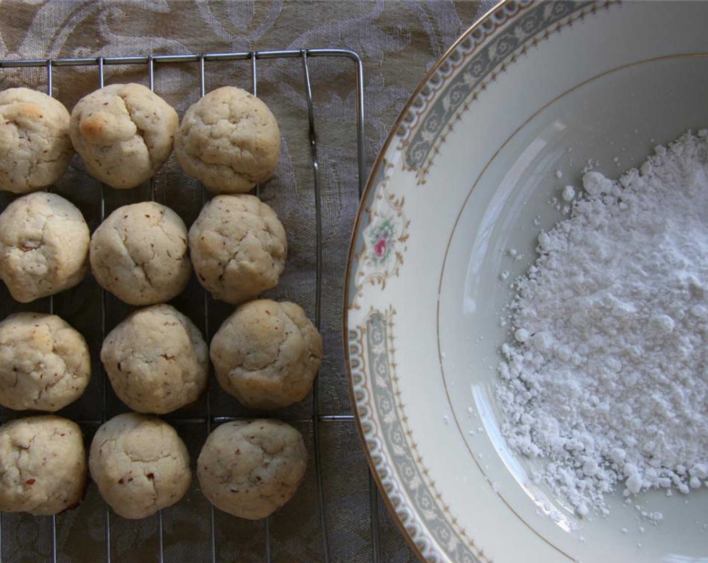 step 6 Roll warm cookies in Powdered Confectioners Sugar (to taste).