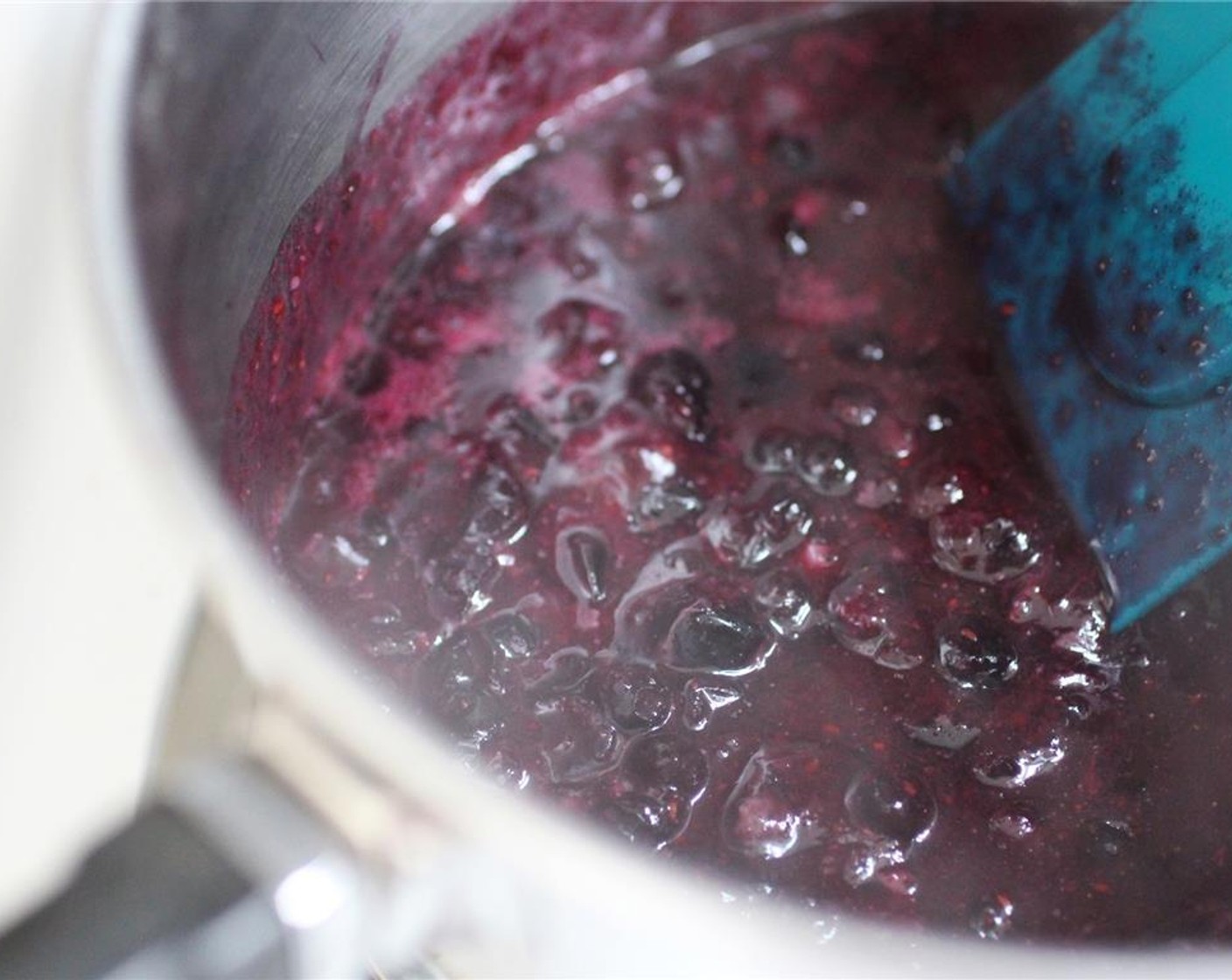 step 3 Continue to simmer for about 10-15 minutes, or until the blueberries are broken down and slightly runny.