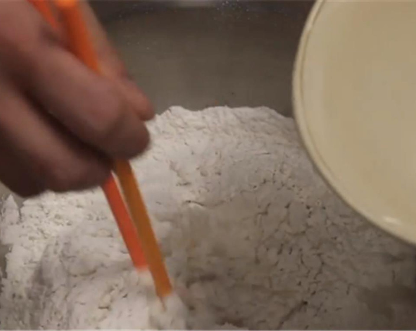 step 1 In a large mixing bowl, add All-Purpose Flour (4 cups). Slowly add Water (2 cups), while gently mixing.