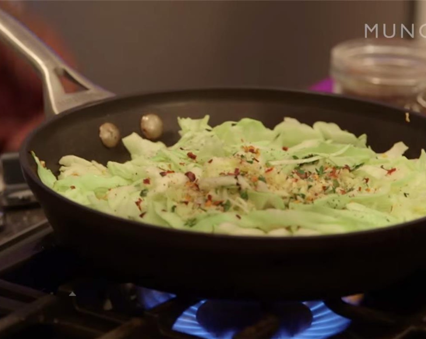 step 4 In a sauté pan over high heat, add Vegetable Oil (1 Tbsp) and get it hot (almost smoking). Add cabbage, thyme and Crushed Red Pepper Flakes (2 pinches) to the pan. Hit it with some Salt (to taste) and Ground Black Pepper (to taste). Let it braise in its own juices for 3 minutes.