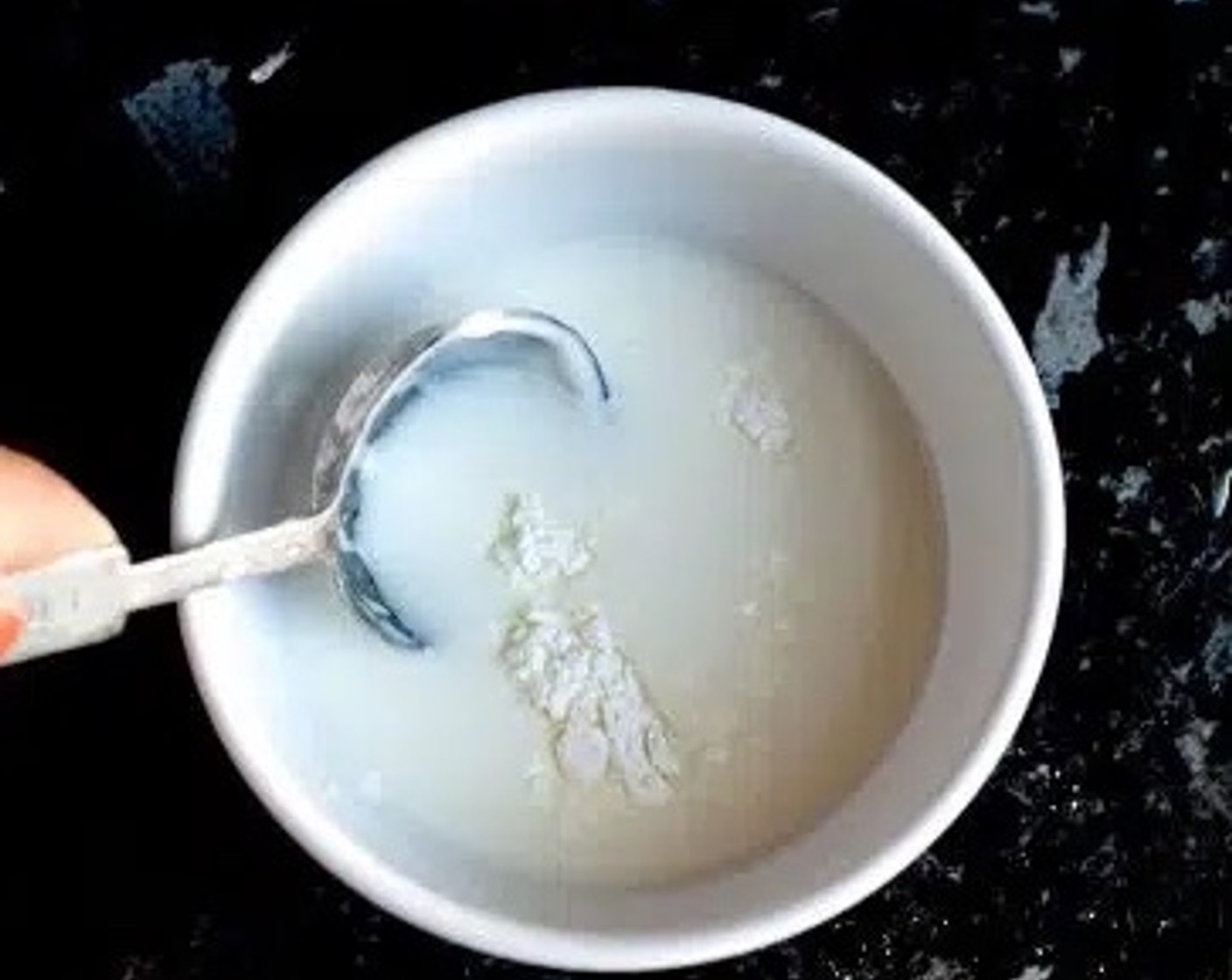 step 6 Mix together Corn Starch (2 Tbsp) and Water (3 Tbsp) in a small bowl. Give the soup a final taste, add any extra salt if needed.