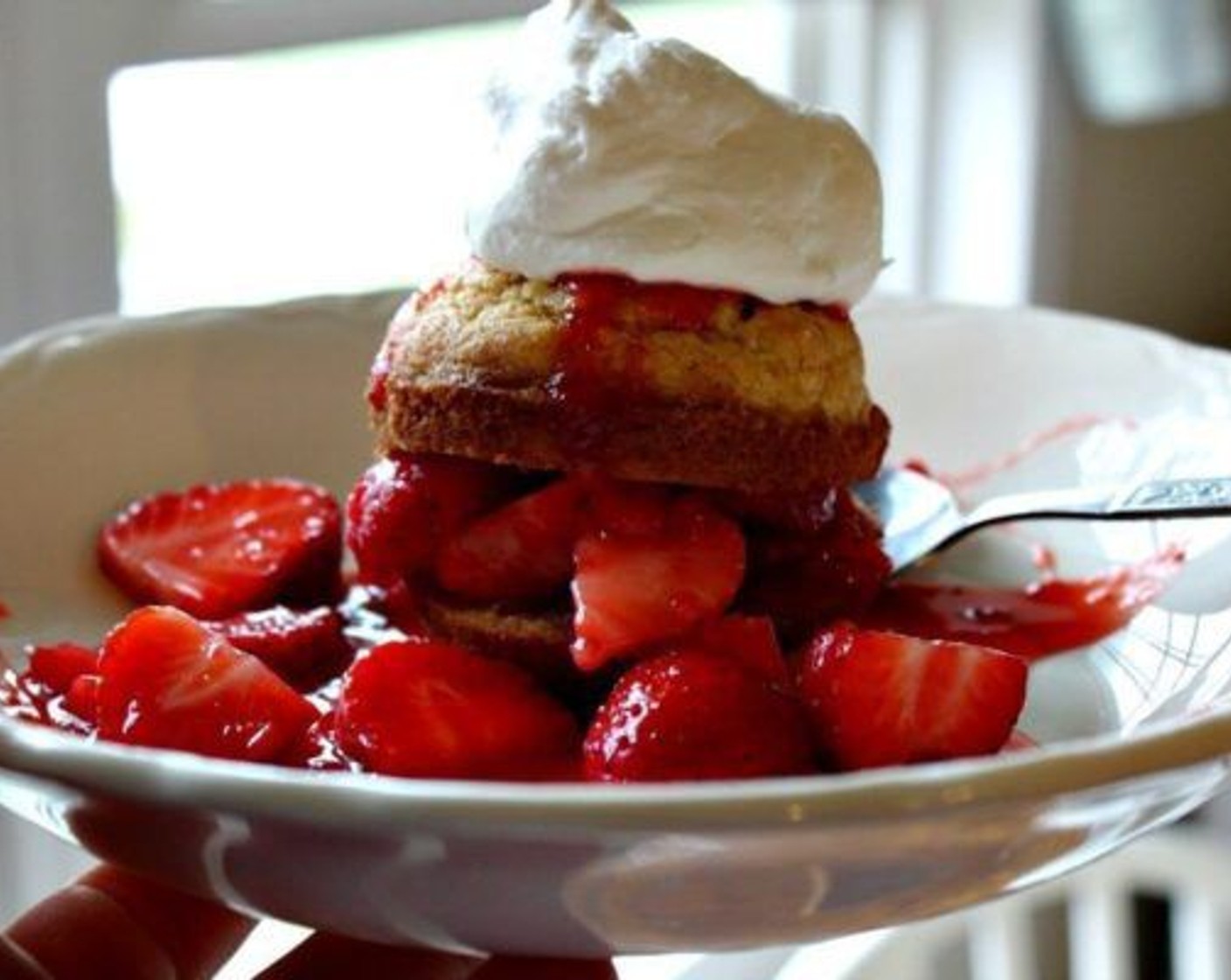 step 10 Slice the muffin in half and spoon on a heaping helping of the fresh strawberries. If desired, top with the remaining muffin half. Top them with home-made whipped cream and serve! Enjoy!