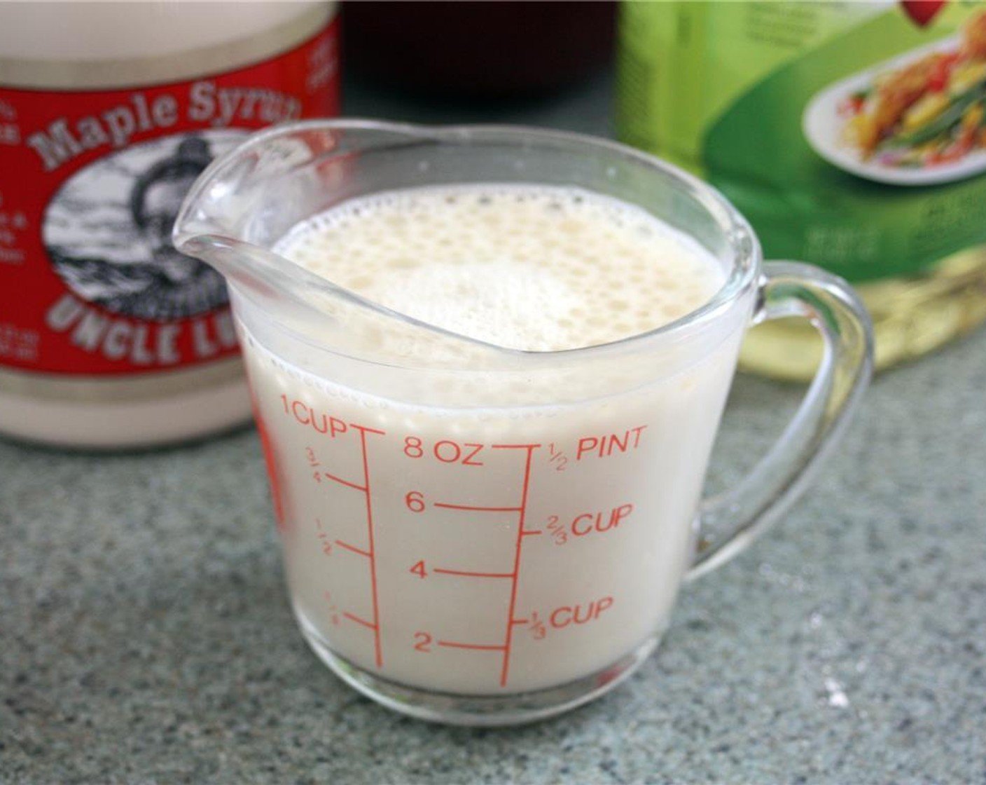 step 5 Add the Pure Maple Syrup (1 Tbsp) and Oil (1 Tbsp) to the milk and stir.