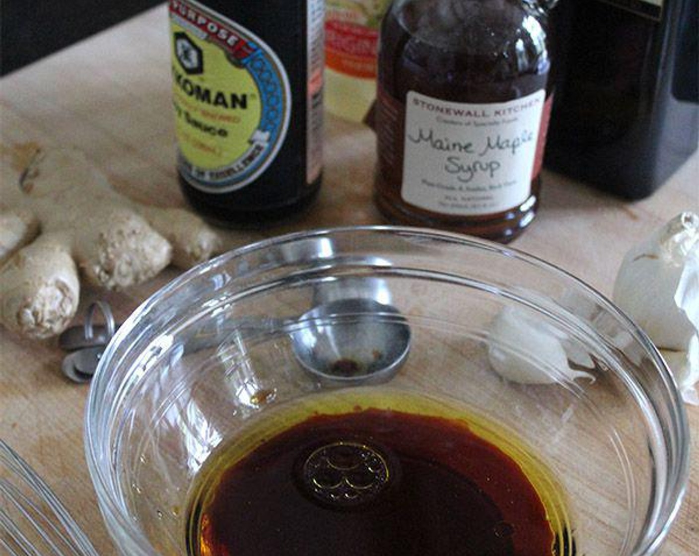 step 1 In a small bowl, whisk together the Pure Maple Syrup (2 Tbsp), Fresh Ginger (1/2 Tbsp), Garlic (2 cloves), Soy Sauce (2 Tbsp), Rice Vinegar (1/2 Tbsp), and about 3 tablespoons Extra-Virgin Olive Oil (as needed). Set aside.