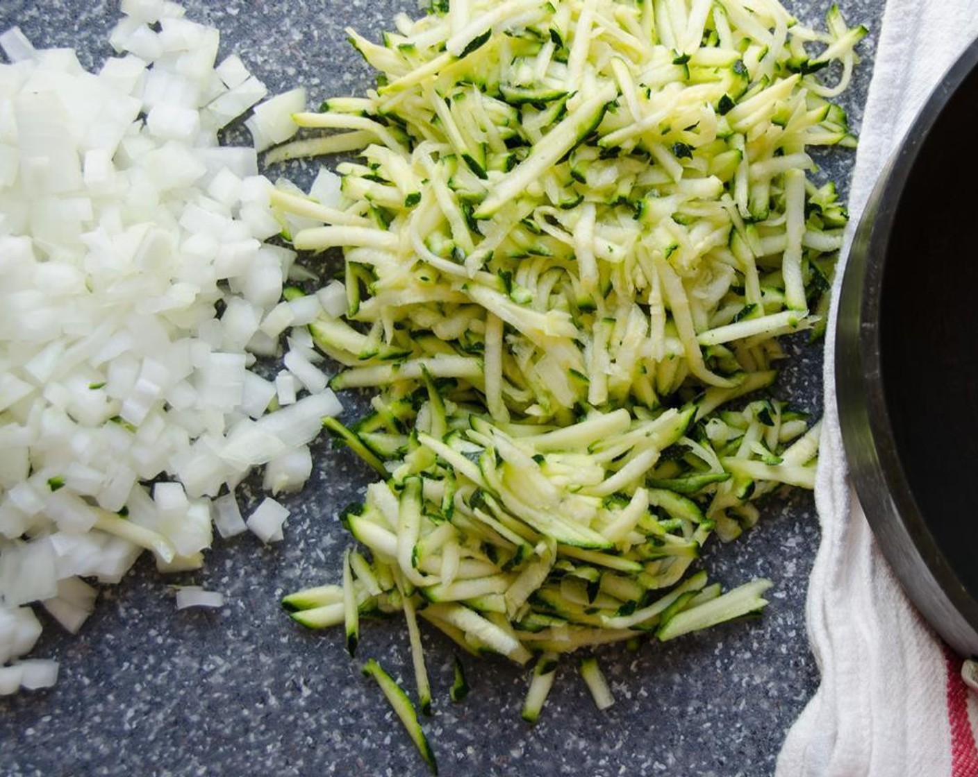 step 3 Finely chop the Onion (1), Grate the Zucchini (1). Drain and chop the Capers (1 1/2 Tbsp) and the Sun-Dried Tomatoes (1/2 cup). Finely chop the Garlic (1 clove). Set aside.