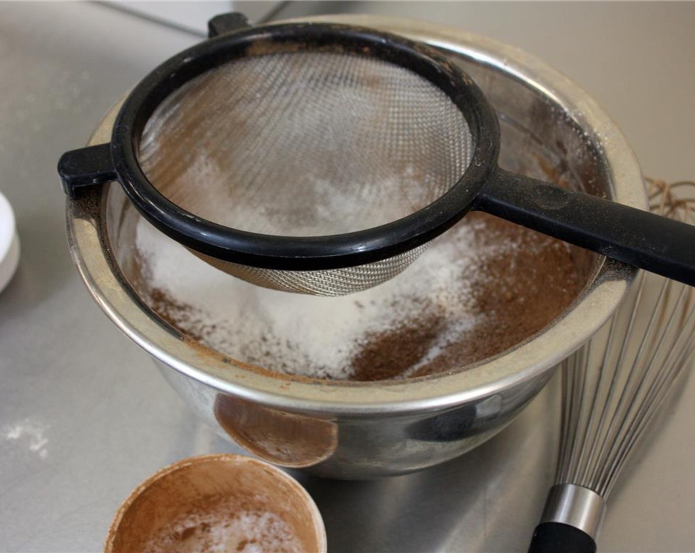 step 4 Sift the Brown Rice Flour (3/4 cup), Arrowroot (2 Tbsp), Unsweetened Cocoa Powder (1/4 cup), Salt (1/2 tsp), and Baking Soda (1/4 tsp) into the same mixing bowl as the almonds. Whisk well to combine, set aside.