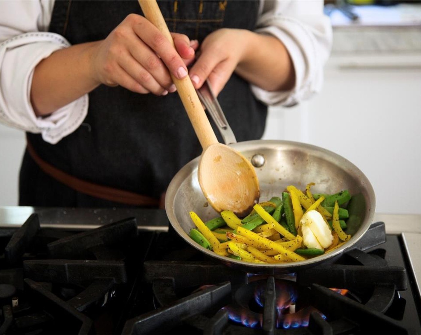 step 12 In the same pan, over medium heat, add one teaspoon of oil and saute Sugar Snap Peas (2/3 cup) for two minutes.