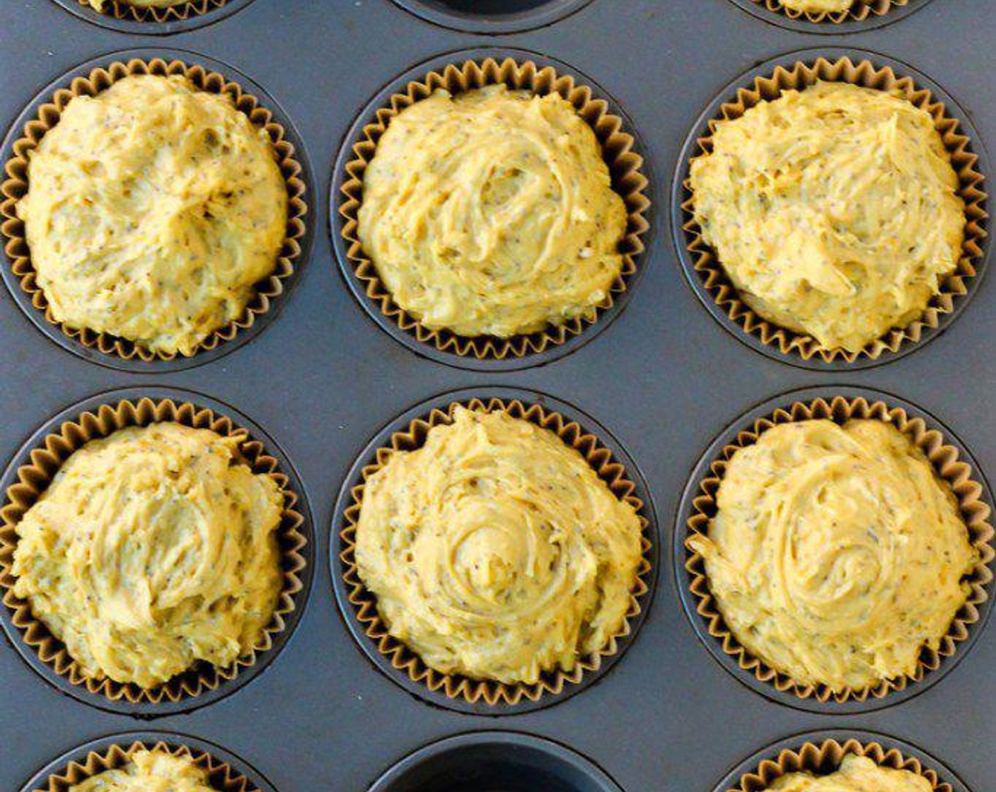 step 6 Fold dry ingredients into wet ingredients until well combined and portion evenly to fill 10 muffin cups. Bake for 15 minutes, remove from oven and place muffins on a cooling rack.