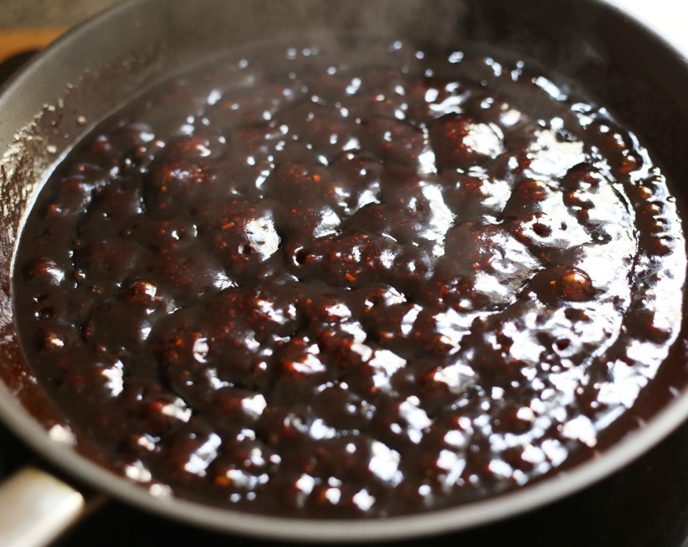 step 11 Add the combined sauce ingredients to a saucepan or skillet. Cook over medium heat for around 2 minutes until it starts to bubble and the sugar has dissolved.