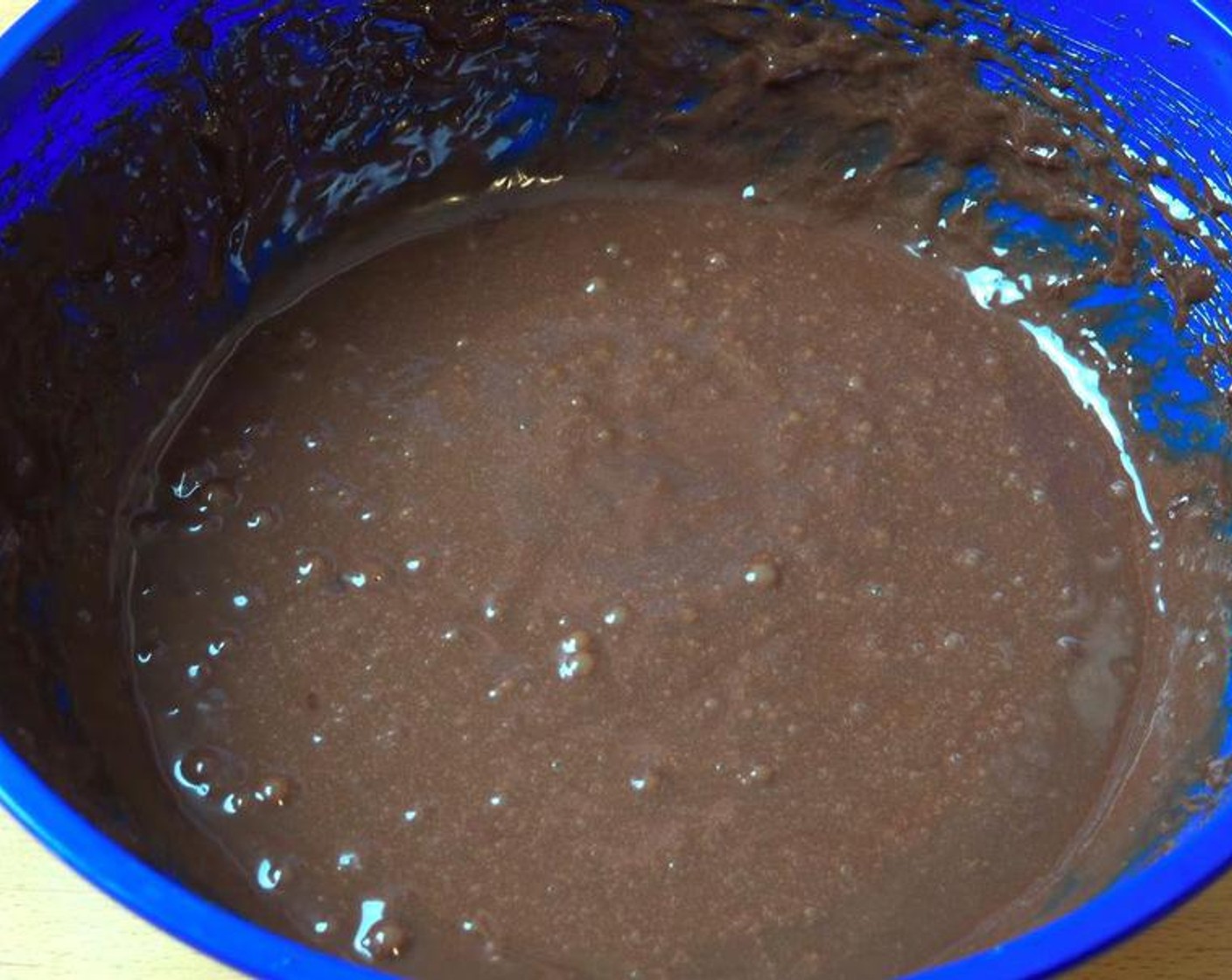step 2 In a large mixing bowl, add Nutella® (2 1/3 cups) and Eggs (4). Beat with a hand mixer until smooth.