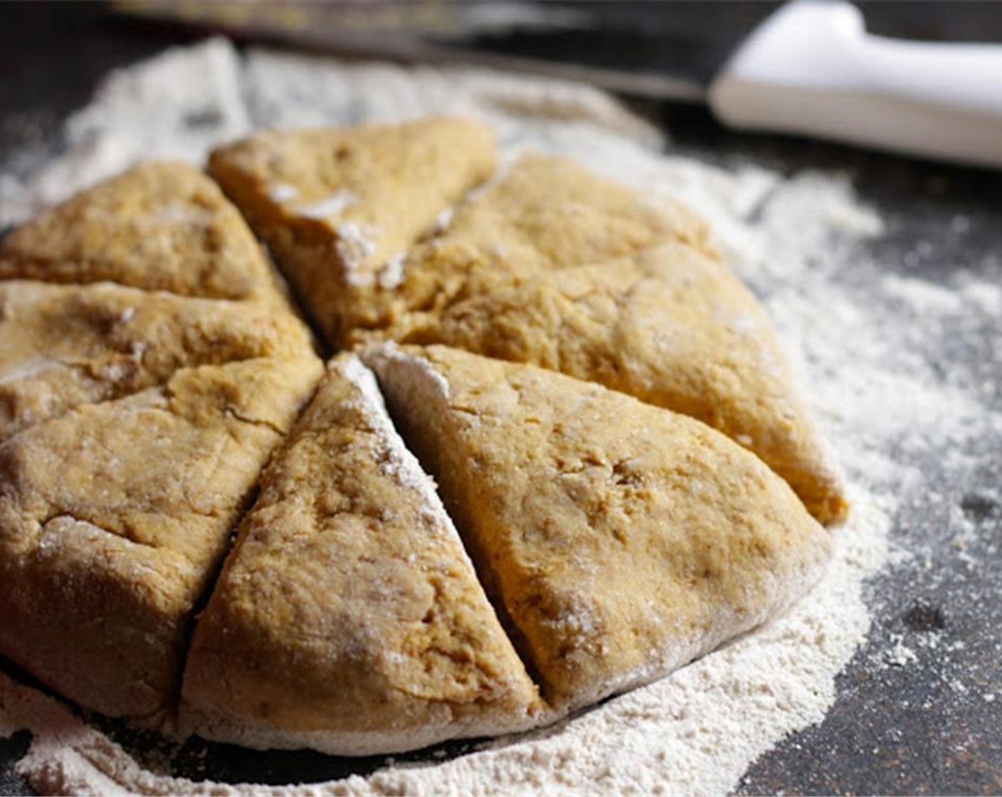 step 6 Slice into 8 triangles, and place onto baking sheet. Place into oven and bake for 13 to 15 minutes.