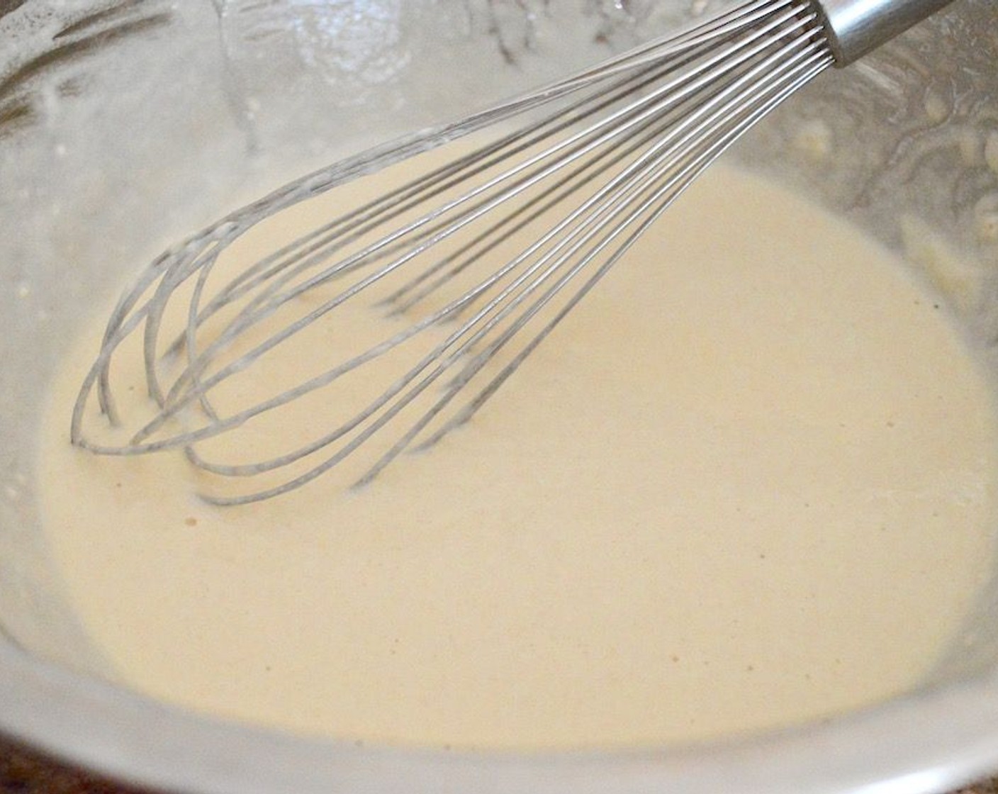 step 1 Whisk All-Purpose Flour (2 cups), Baking Powder (1 tsp), and Salt (1 tsp) together in a large mixing bowl to aerate them. Then whisk in Honey (2 Tbsp), followed by the cold Soda Water (2 1/4 cups). Whisk it all together thoroughly until it is smooth, then refrigerate it until you are ready to fry.