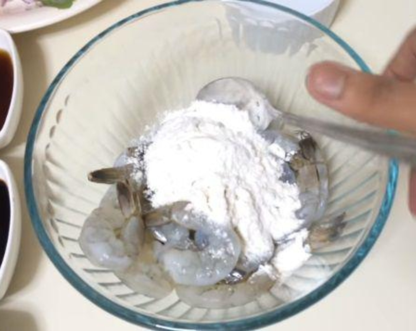 step 1 In a mixing bowl, mix together the Shrimp (1 lb), and All-Purpose Flour (1/4 cup).