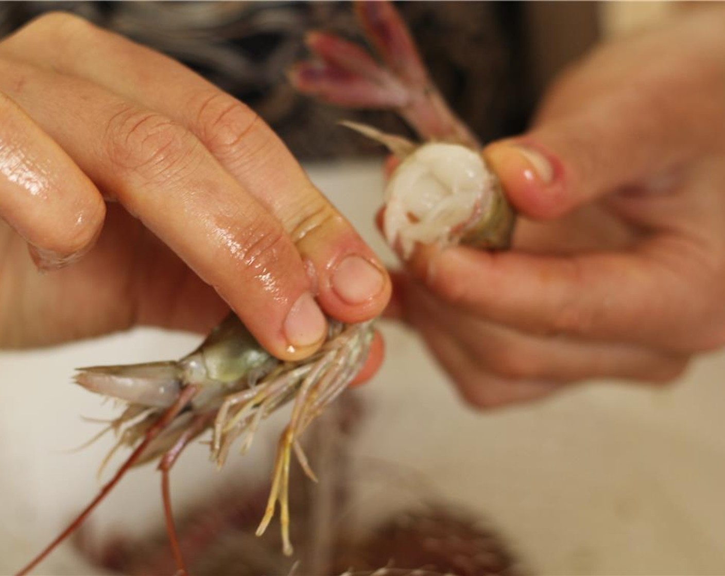 step 1 Peel the Shrimp (1 lb). First, twist and remove the head.