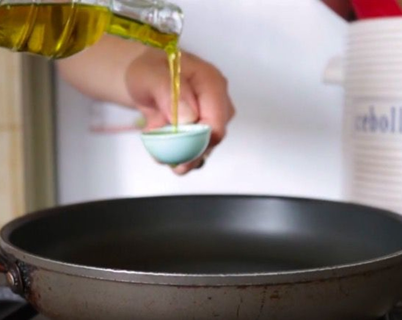 step 9 Heat a nonstick frying pan over a medium-high heat and add Extra Virgin Spanish Olive Oil (2 Tbsp). Let warm up for 2 minutes.