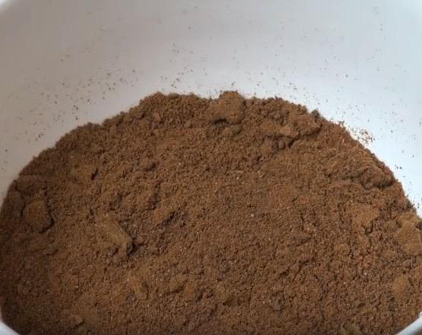 step 3 In a mixing bowl, add Chocolate Biscuits (2 cups) and Butter (1/3 cup). Stir together until mixture has the appearance of wet sand.