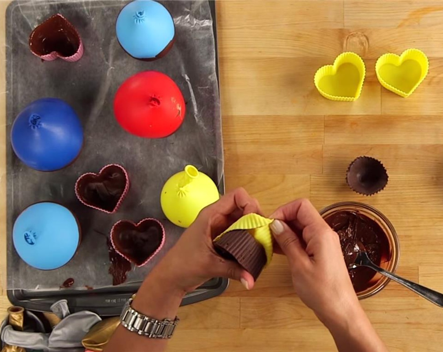 step 5 In order to remove the balloon, snip off the knot, allowing the ballon deflate. Remove chocolate from silicon mold gently as well.