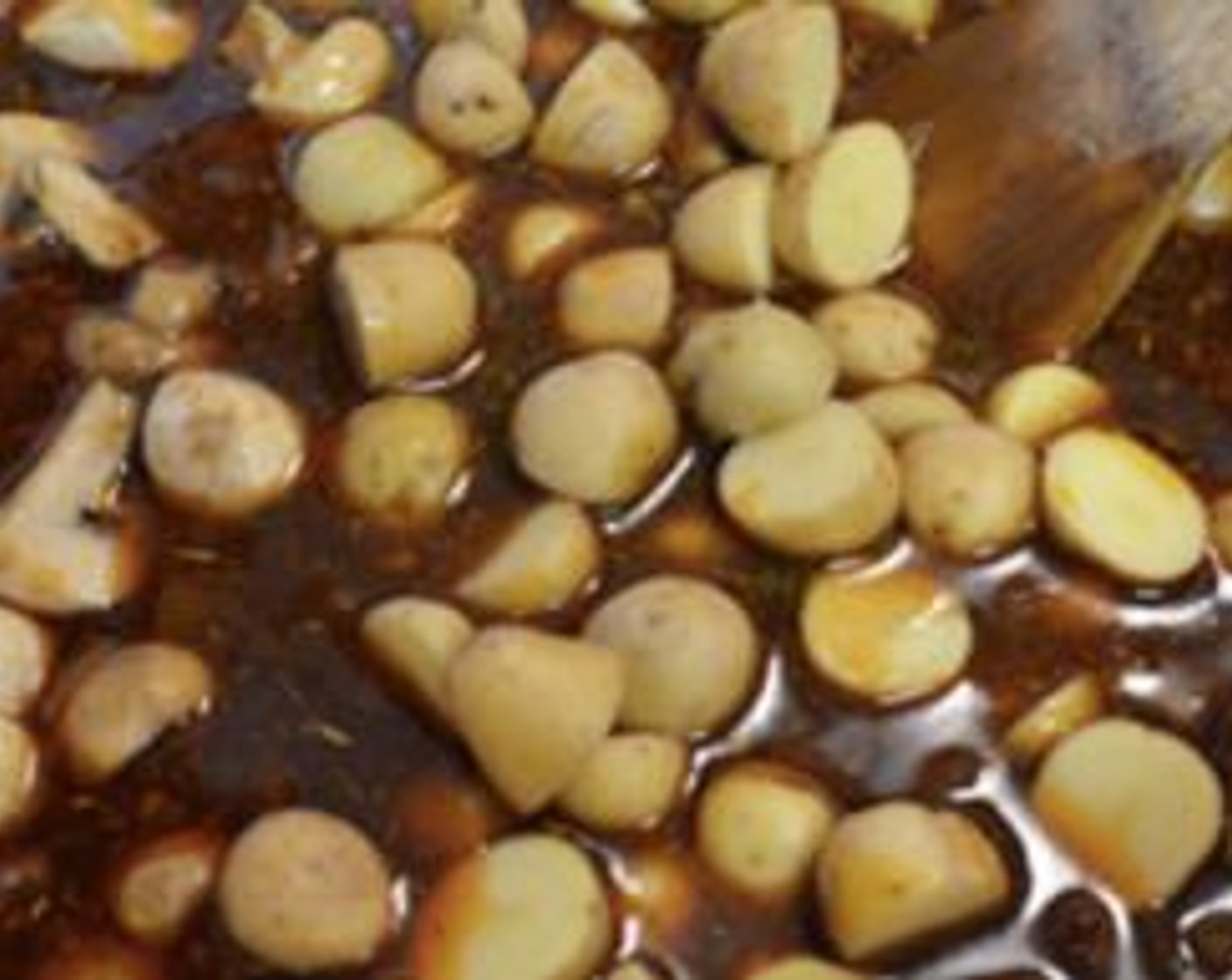 step 11 After about an hour, add the diced Potatoes (2 cups) to the stew. Put the lid back on and give the stew another 30 minutes on low heat.