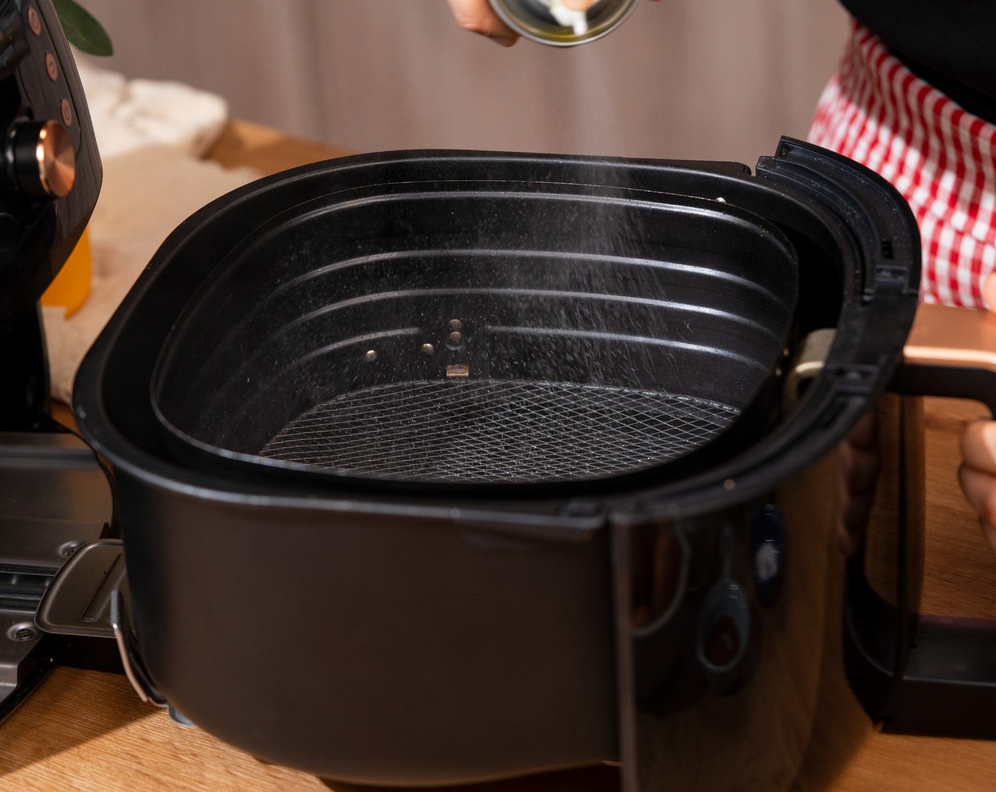 step 1 Spray an air fryer basket with Non-Stick Baking Spray (as needed).