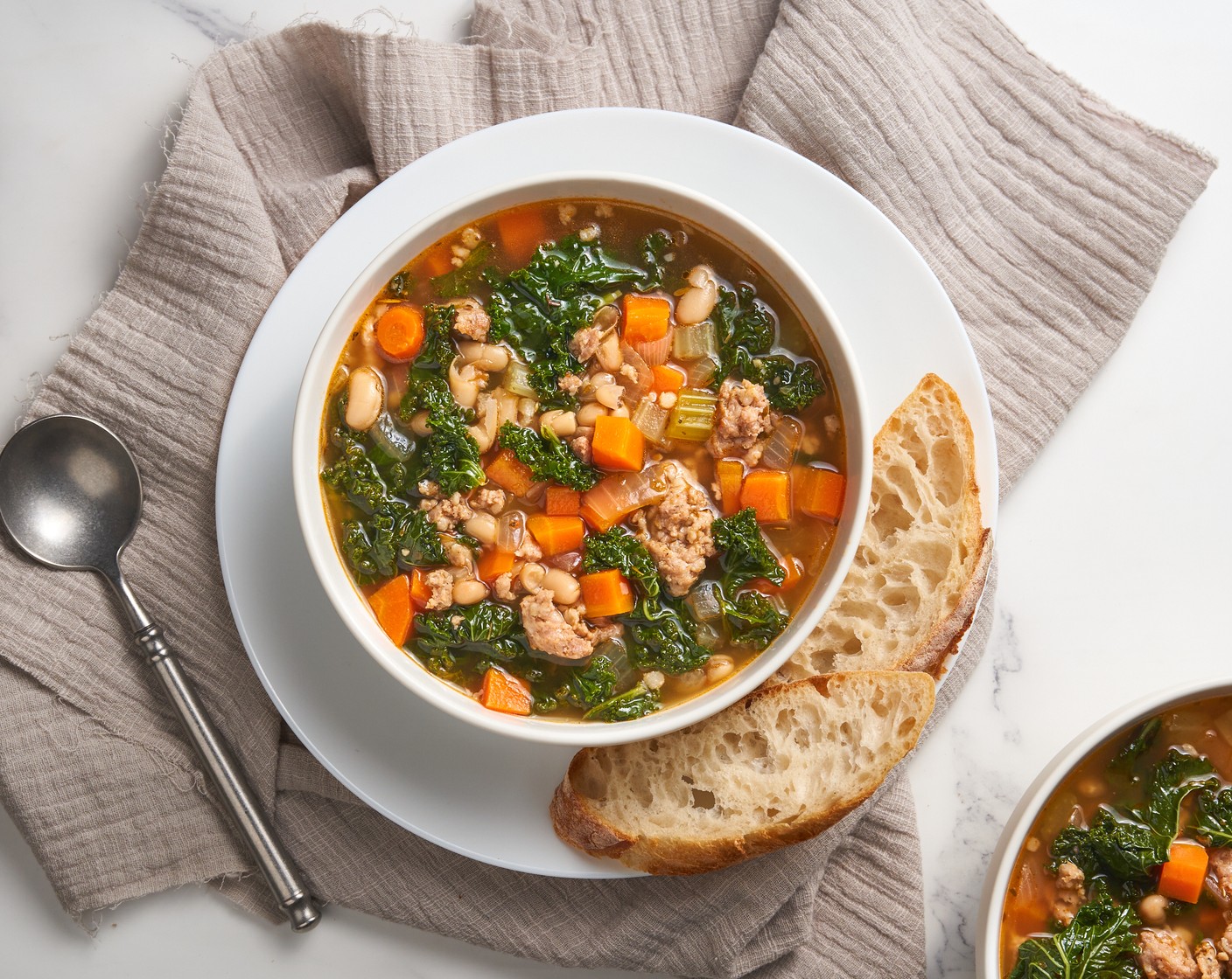 Vegan Sausage White Bean Kale Soup