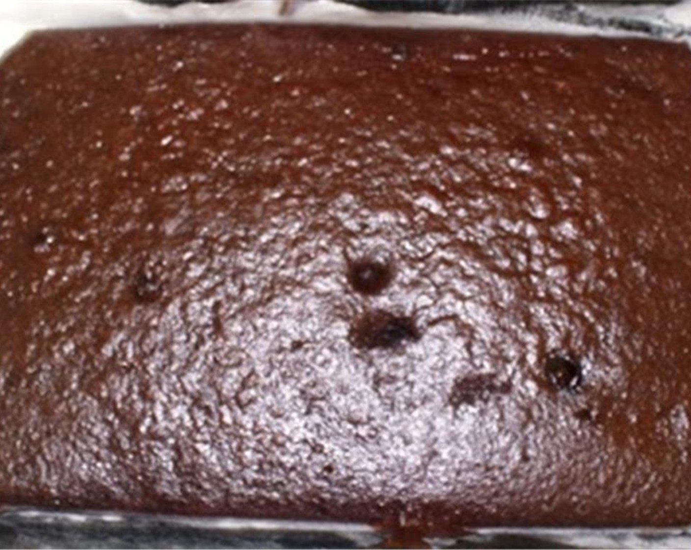 step 4 Pour the batter into a prepared baking pan. Bake for 20 to 25 minutes or until the brownies are almost done.