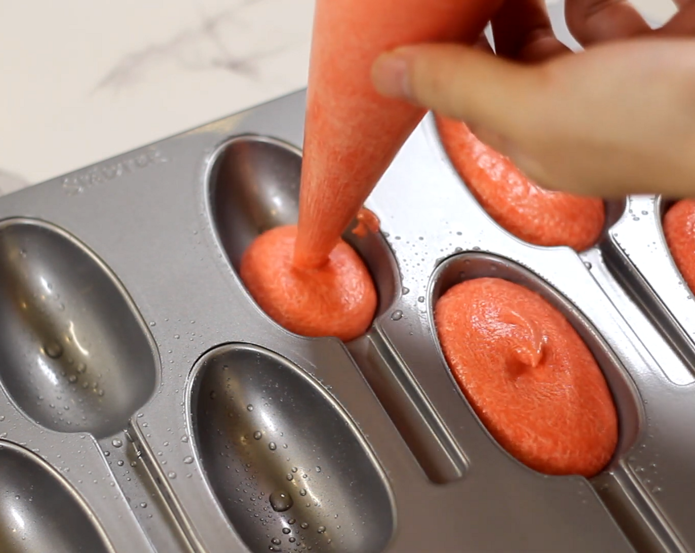 step 8 Pipe out your batter neatly into the mold.