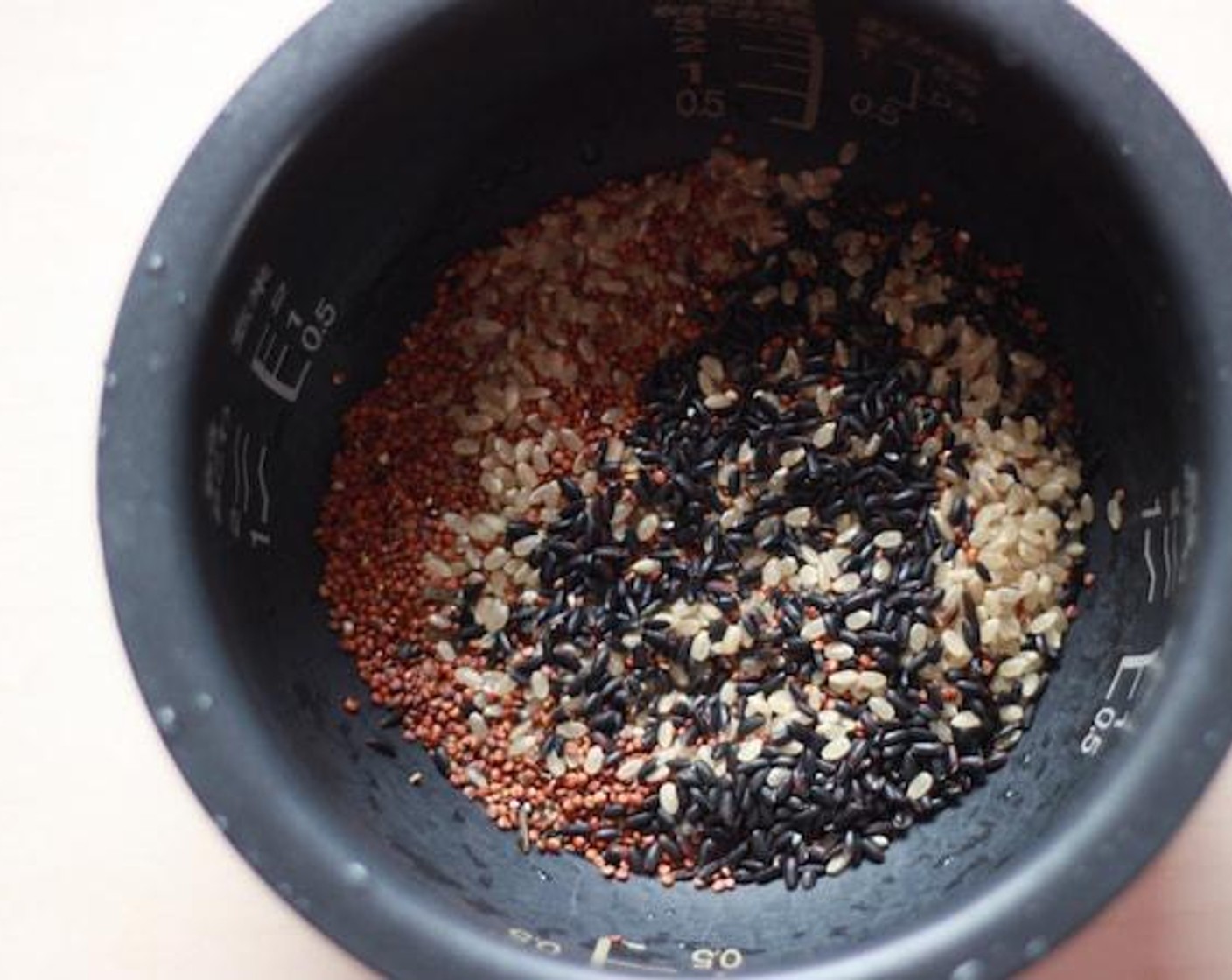 step 3 Cook Black Rice (1/4 cup), Brown Rice (1/3 cup), and Quinoa (1/3 cup) with Water (1 cup).