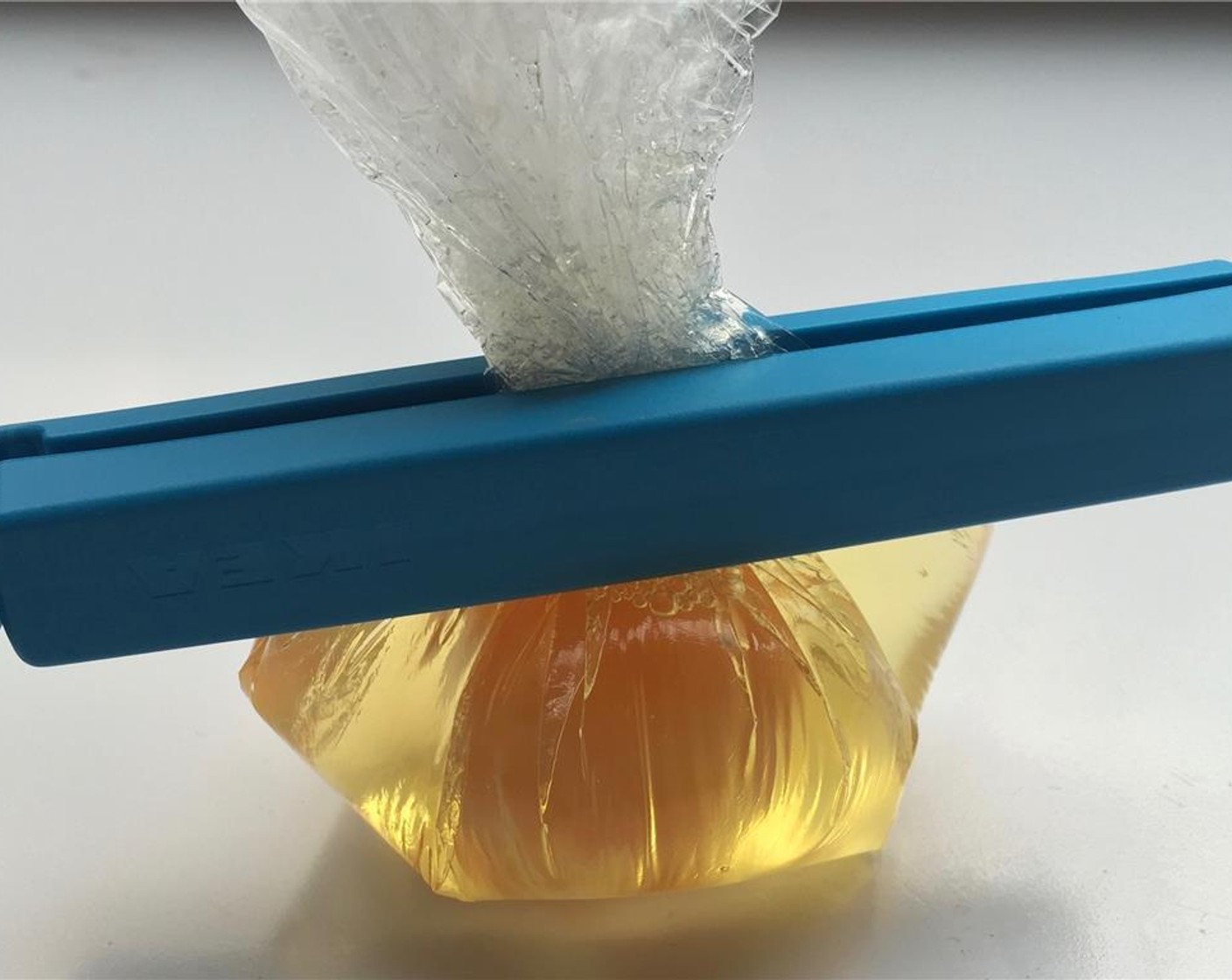 step 5 Close the egg pocket with a plastic bag clip (or rubber band). You should end up with a neatly wrapped egg.