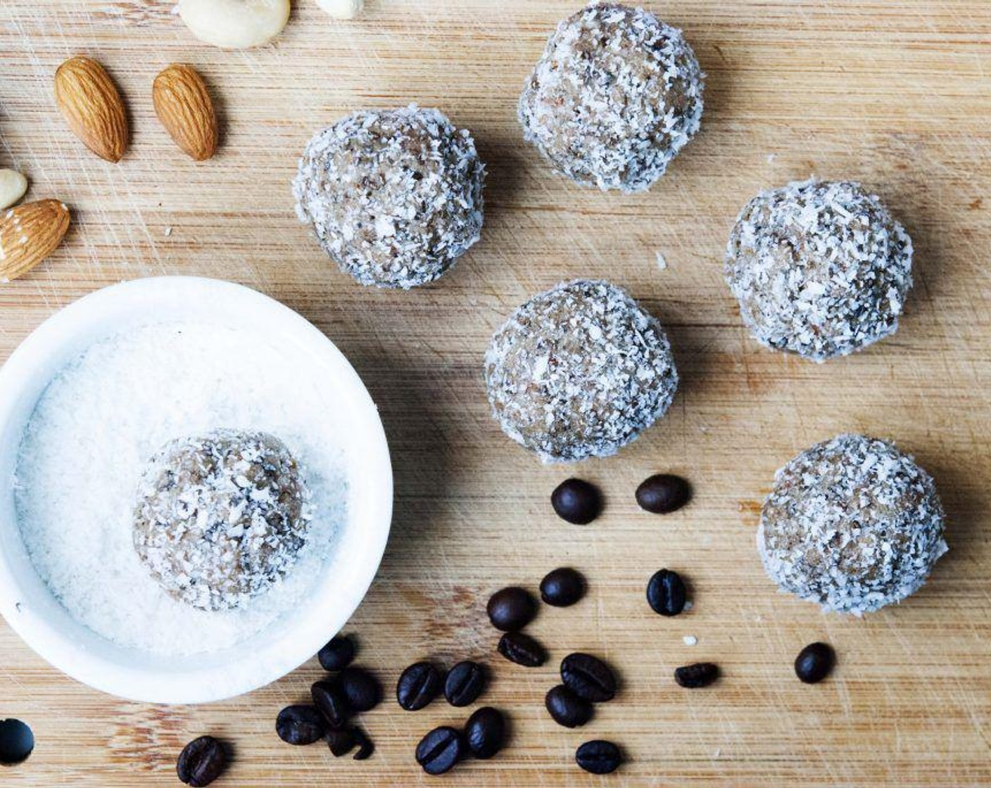 step 3 Roll them mixture into 30 gram balls, then coat each ball into Unsweetened Coconut Flakes (to taste). Refrigerate for a couple of hours before serving.