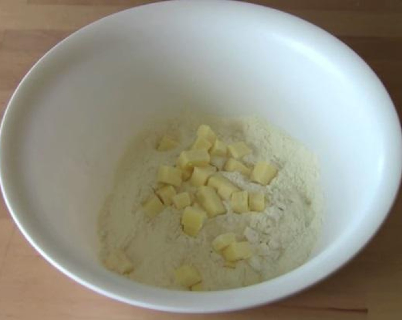 step 1 Inside a mixing bowl, mix together the Self-Rising Flour (3 cups), Salt (to taste) and Butter (5 cups).